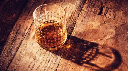 Strong alcohol on a wooden table