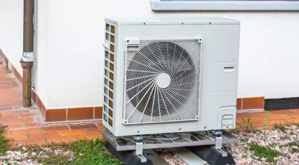 A heat pump outside a home