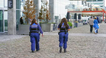 Enforcement officers on a street in Rotterdam 