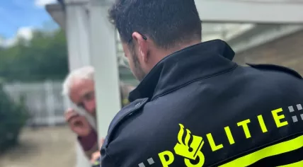 Police officer checks in on elderly man 