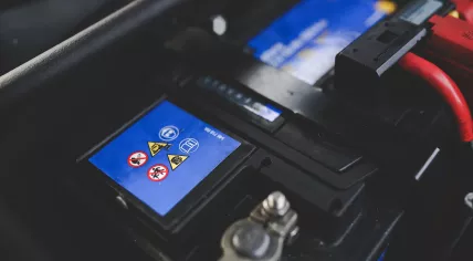 Warnings detailed on a car battery. 31 May 2015