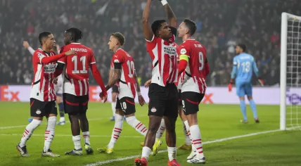 PSV's Ryan Flamingo celebrates after scoring his side's opening goal during the Champions League opening phase soccer match between PSV Eindhoven and Girona at Philips stadium in Eindhoven, Netherlands, Tuesday, Nov. 5, 2024.