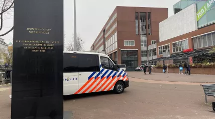 A police van at Amsterdam’s City Hall parked behind a monument to Jews from the capital killed during World War II. 8 November 2024