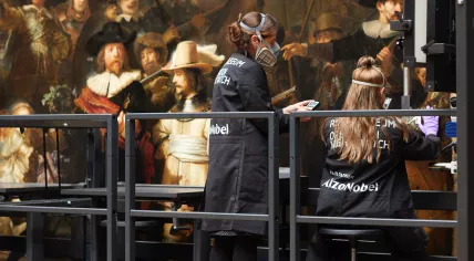 Operation Night Watch: Rijksmuseum conservators working on the Rembrandt van Rijn masterpice The Night Watch