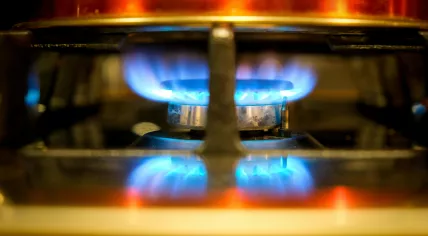 Heating up a pot over a gas stove