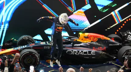Red Bull driver Max Verstappen of the Netherlands celebrates after winning the Qatar Formula One Grand Prix at the Lusail International Circuit in Lusail, Qatar, Sunday, Dec. 1, 2024.