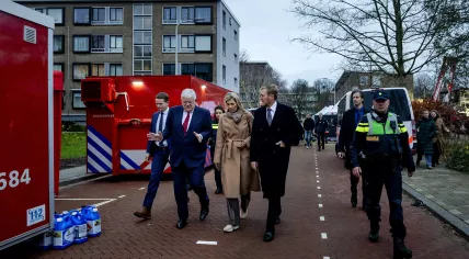 King Willem-Alexander, Queen Maxima, and Hague mayor Jan van Zanen visiting the disaster site on Tarwekamp where two explosions killed at least six people and destroyed five apartments, 9 December 2024