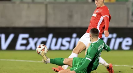 Ruben van Bommel (R) of AZ and Dinis Almeida (L) of Ludogorets in action during the UEFA Europa League match between PFC Ludogorets Razgrad and AZ Alkmaar, in Razgrad, Bulgaria, 12 December 2024. 
