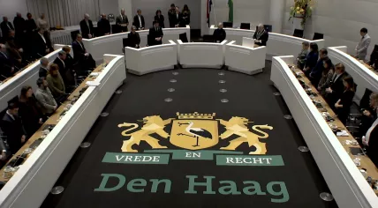 Members of The Hague City Council observe a moments silence for the victims of the explosion at the Tarwekamp, December 18, 2024.