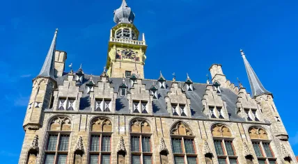 Veere, Zeeland, The Netherlands - 10 August 2022: front exterior view of the old town hall in the town of Veere