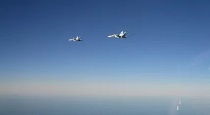 Dutch F-35 fighter jets flying through the sky