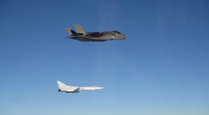 Dutch F-35 fighter jets flying through the sky