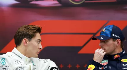 Mercedes driver George Russell speaks with Red Bull’s Max Verstappen after a controversial qualifying round ahead of the Formula 1 Grand Prix in Qatar. 30 November 2024