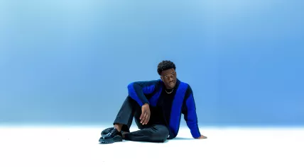 Claude Kiambe, better known only by his first name, during a photoshoot to announce the Dutch entry for the 2025 Eurovision Song Contest