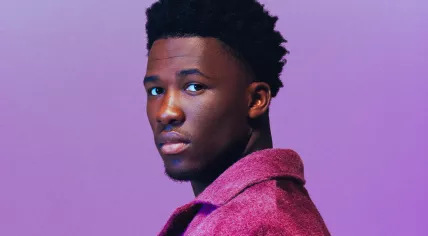 Claude Kiambe, better known only by his first name, during a photoshoot to announce the Dutch entry for the 2025 Eurovision Song Contest