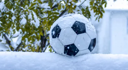 Football during a snowing day