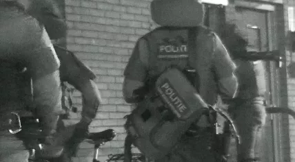 Police officers conducting raids in Amsterdam after criminals were a part of violent crime in Cologne,Germany.