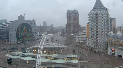 Looking out at Rotterdam's Markthal, Station Blaak, the Grotemarkt and a few of the cube houses on a blustery New Year's Day. 1 January 2025