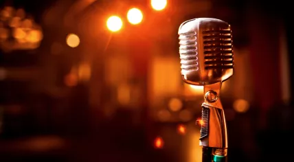 A retro microphone on a stage