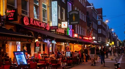 Bars and restaurants on Korte Leidsedwarsstraat in Amsterdam at night