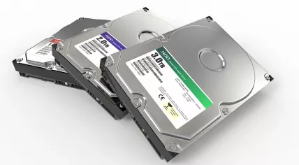 Three ATA Hard disk drives on a white background