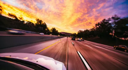 Cars on the highway at dusk in Irvine, California. Nov 12, 2016