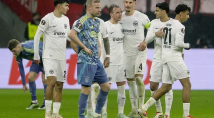 Players of Eintracht Frankfurt gather during the UEFA Europa League Round of 16, 2nd leg soccer match Eintracht Frankfurt against Ajax Amsterdam, in Frankfurt Main, Germany, 13 March 2025