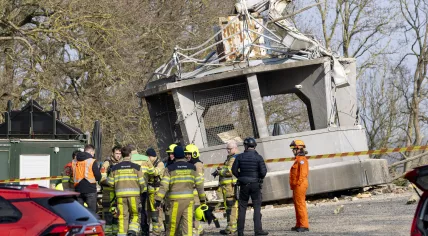 Workers surround the collapsed Wilhelminatoren, March 16, 2025.