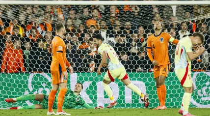 Mikel Merino of Spain scores the 2-2 goal during the UEFA Nations League quarter-final match between Netherlands and Spain at Feyenoord Stadion de Kuip on March 20, 2025 in Rotterdam, Netherlands.