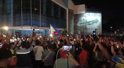 People gathered outside the gates of Villamor Air Base in Metro Manila, where former Philippine President Rodrigo Duterte was detained, protesting the arrest of Duterte by the Philippine National Police and Interpol on the basis of an International Criminal Court (ICC) warrant charging him with crimes against humanity.