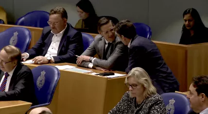 JA21 MP Joost Eerdmans is congratulated by PVV MP Willem Boutkan after the Tweede Kamer voted against supporting the €800 billion ReArm Europe plan. 11 March 2025