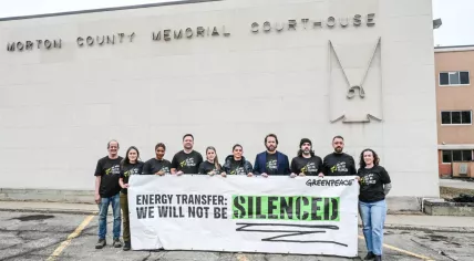 Greenpeace activists protesting against Energy Transfer, an American energy company that sued it for defamation when it protested against the construction of an oil pipeline through the Standing Rock Reservation in North Dakota. 20 March 2025