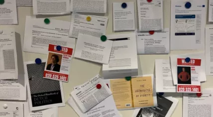 Wanted posters of University of Amsterdam board members accusing them of complicity in genocide in Gaza hung on a notification board at the Science Park, March 2025