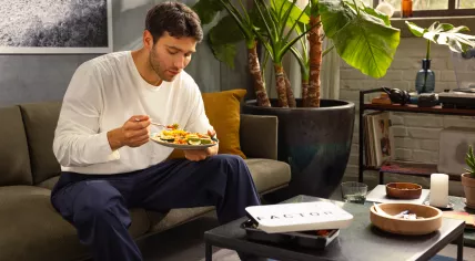 Eating a ready meal from Factor