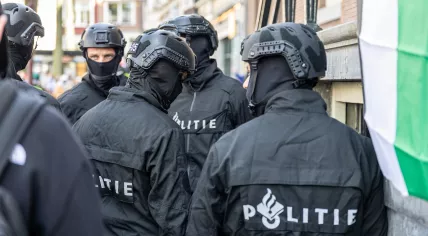 Dutch riot police intervene at the Maagdenhuis, the administrative center of the University of Amsterdam (UvA), which is occupied by pro-Palestinian demonstrators. April 14, 2025.