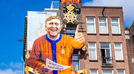 Traditional annual mural for King's Day at cafe De Blaffende Vis in the Westerstraat in the Jordaan in Amsterdam.