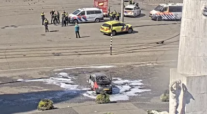 A car believed to be intentionally set on fire at Dam Square in Amsterdam. 3 April 2025