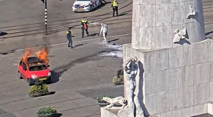A car believed to be intentionally set on fire at Dam Square in Amsterdam. 3 April 2025