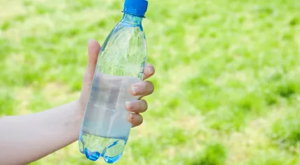 Offering a bottle of water