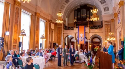 Rotterdam mayor Carola Schouten awarding royal ribbons during the lintjesregen the day before King's Day, 25 April 2025