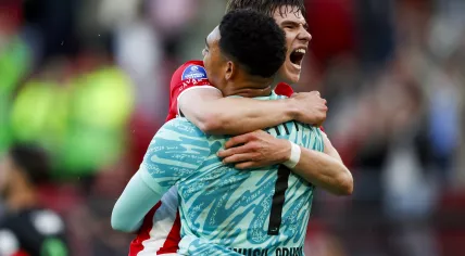 AZ goalkeeper Rome-Jayden Owusu-Oduro, Wouter Goes of AZ Alkmaar celebrate the win during the Dutch Eredivisie play-offs final match for European football between AZ and FC Twente at the AFAS Stadion on May 25, 2025 in Alkmaar, Netherlands.