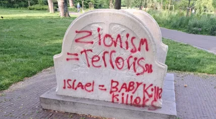 Anti-Israel texts spray-painted on a statue in Amsterdam's Oosterpark, 14 May 2025