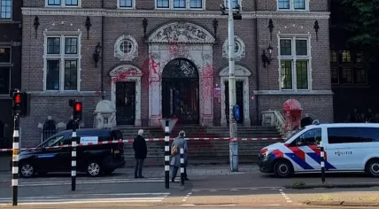 Red paint smeared all over the main entrance for events organized at KIT in Amsterdam ahead of CIDI's 50th anniversary bash. 18 May 2025