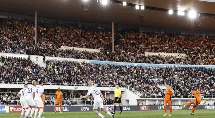 Oliver Antman of Finland, Teemu Pukki of Finland, Robert Ivanov of Finland, Jere Uronen of Finland, and Frenkie de Jong of Netherlands watch Memphis Depay of Netherlands take a free kick during the World Cup qualifying match between Finland and Netherlands at the Olympic Stadium on June 7, 2025 in Helsinki, Finland.
