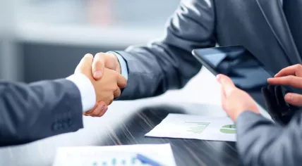 Businessmen shake hands