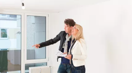 Two people at a house viewing