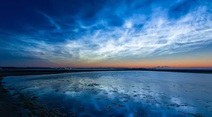 Noctilucent clouds over the Baltic Sea as viewed from Laboe, Germany. 21 June 2019