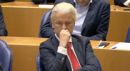 PVV leader Geert Wilders listens as Prime Minister Dick Schoof speaks to the Tweede Kamer ahead of the debate on the fall of his first Cabinet. 4 June 2025