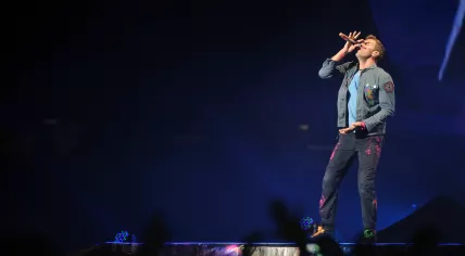 Chris Martin of Coldplay performs during a concert in Prague, Czech Republic, Sept. 16, 2012. 
