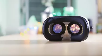 Virtual reality device playing video at night